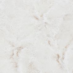 a white marble textured background with some brown spots