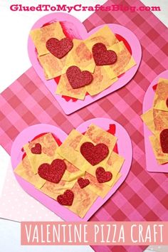 valentine's day craft for kids made with heart shaped pieces of paper and glue