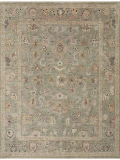 an antique rug with many different colors and designs on the carpet is shown in this image