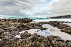 the rocks are covered in snow and ice