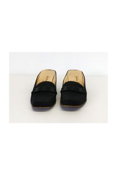 Basic black slip ons that can be worn for work or play. Designed in a square toe shape with a strap design along the front. These will become a go-to pair. Size 7.5 Fabric & leather Leather sole Made in Italy Slip on style Square toe Strap detail on front Square heel Some outsole wear Some scuffs on front on sole Heel height 2.25" Black Square, Strap Design, Black Slip Ons, Slip Ons, Heel Height, In Italy, Size 7, Slip On, Italy