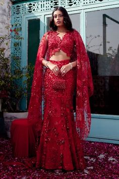 Red attached cancan structured mermaid lehenga features intricate cutdana, dori, red sequins, beads, and floral applique work embroidery. Comes with matching padded blouse with floral applique detailing highlighted with nalki crystals and beads and a heavily embroidered dupatta with botanical motifs. - Aza Fashions Mermaid Lehenga, Skirt Lehenga, Cutdana Work, Butterfly Net, Lehenga Red, Red Mermaid, Lehenga Designs Simple, Applique Work, Gaun Fashion