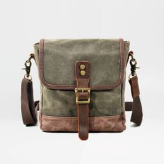 Mens Waxed Canvas Messenger Bag Full Grain Leather With Canvas Shoulder Bag Crossbody Bag Gift For Him MC6070 Model Number: MC6070 Dimensions: 9"L x 2.8"W x 10.6"H / 23 cm(L) x 7 cm(W) x 27 cm(H) Weight: 1.1 lb / 0.5 kg Hardware: Brass Hardware Shoulder Strap: Adjustable & Removable Color: Khaki / Army Green / Dark Grey Features: • Waterproof Waxed Canvas With Full Grain Leather• Inside 1 Cell Pocket, 1 Zipper Pocket.• YKK Zipper• Adjustable Shoulder Strap• Can fit an iPad mini, Mobile Phone, Wa Cheap Waxed Canvas Shoulder Bag For Daily Use, Mens Canvas Messenger Bag, Mobile Bag, Everyday Purse, Small Messenger Bag, Canvas Purse, Side Bag, Canvas Messenger Bag, Side Bags