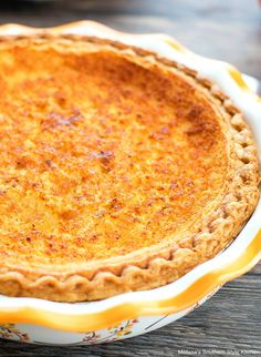 a pie sitting on top of a wooden table