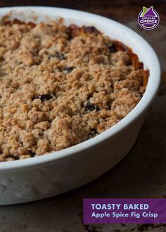 a close up of a casserole dish with crumbs in it on a table