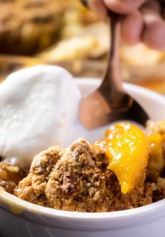 a close up of a bowl of food with ice cream