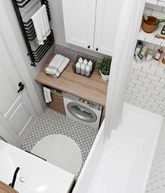 a small bathroom with a washer and dryer