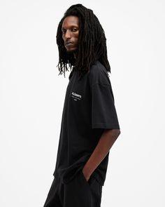 Crafted from organic cotton and shaped to an oversized fit. Our signature is on the chest and back, from London to Tokyo – this is the Underground T-Shirt. Your timeless wardrobe essential that can be worn anywhere, anytime. It goes with everything, we're not surprised it's our best seller.  This t-shirt is designed to be worn oversized If you are between sizes or prefer a closer fit, we recommend sizing down Pullover Crew neck Short sleeves AllSaints signature logo on the chest and centre back Essential Cotton T-shirt With Letter Print, Allsaints Relaxed Fit Short Sleeve Tops, Allsaints Short Sleeve Tops With Relaxed Fit, Allsaints Black Cotton Tops, Black Cotton Tops By Allsaints, Organic Cotton T-shirt With Logo For Streetwear, Organic Cotton Logo Print T-shirt For Streetwear, Cotton T-shirt For Streetwear, Essential Cotton T-shirt For Streetwear