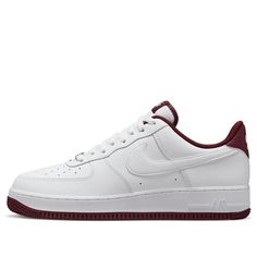 The Nike Air Force 1 '07 is the perfect sneaker for any basketball fan. Its iconic silhouette features a white leather upper, wine red accents and a rubber sole for maximum comfort. This classic design is inspired by the original AF1, released in 1982, and is sure to turn heads. Whether you're on the court or just out and about, the AF1 '07 is the perfect shoe for any activity. With its timeless style and modern features, you'll be sure to stand out. (AF1/SNKR/Skate/Men's/Light/Low Top/Classic/Non-Slip) Nike Air Force 1 Custom Men, Classic Basketball Shoes With Air Max Cushioning, Nike Airforce1, Nike Air Force 1 Custom, Skate Man, Perfect Sneakers, Air Force 1 Custom, Nike Air Force 1 07, Red Accents