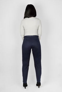 * FINAL SALE * This sleek work trouser comes with a secret weapon: a hidden expandable waistband for a comfy fit, even on your off days. Complete with thoughtful details like a 4” hem that is perfect for cuffing (or lengthening), and sensible, deep pockets. - Model is 5'5" and measures 40.5" at the hip. She is wearing a size S- Hidden, expandable waistband for comfort fit- 4" hem for easy cuffing and lengthening- Waist-to-hip ratio designed for hourglass body shapes- Deep, functional pockets tha Navy Straight Leg Dress Pants For Work, Navy Stretch Pants For Business Casual, Navy Straight Pants For Business Casual, Navy Tapered Leg Workwear Pants, Navy Tapered Leg Pants For Work, Navy High-waisted Pants For Business Casual, Navy Fitted Bottoms For Office, Navy Fitted Dress Pants For Work, Versatile Fitted Straight Leg Chinos