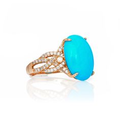 Indulge in the mesmerizing allure of this 6.56 Cts Sleeping Beauty Turquoise and White Diamond Ring. Crafted in 14K yellow gold, this timeless piece exudes elegance and sophistication. The sparkling white diamonds beautifully complement the vibrant turquoise, creating a stunning design that will leave you breathless. Luxury Turquoise Gemstone Ring, Luxury Yellow Gold Turquoise Ring For Formal Occasions, Elegant Turquoise Cabochon Ring, Luxury Yellow Gold Turquoise Ring For Anniversary, Luxury Blue Turquoise Ring For Formal Occasions, Luxury Oval Turquoise Ring, Elegant Turquoise Gemstone Ring For Formal Occasions, Elegant Yellow Gold Turquoise Ring For Formal Occasions, Elegant Turquoise Ring