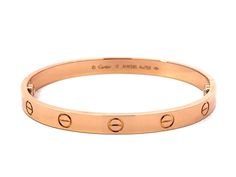 Item Specifications:Brand: CartierStyle: Cartier Love BraceletMetal: 18K Rose GoldSize: 17Width: ~6mmWeight: 30.5 gramsCondition: Excellent, PreownedWas just polished at Cartier, like new Classic Jewelry Pieces, Love Bracelet, Cartier Love, Classic Jewelry, Cartier Love Bracelet, Love Bracelets, Metal Bracelets, Elevate Your Style, 18k Rose Gold