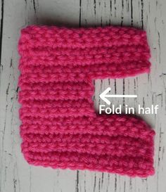 a crocheted pink object is shown with an arrow pointing to the left side