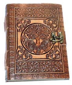 Introducing the Tree of Life Leather Journal: Embrace the Eternal Connection of Celtic Wisdom Step into a world of ancient wisdom and mystical symbolism with our Tree of Life Leather Journal, meticulously hand-tooled and embossed with the Tree of Life and intricate Celtic Knotwork. The border embossing adds a touch of uniqueness to each journal, making it a one-of-a-kind piece. The size of the journal may vary slightly, adding to its individual character. Crafted from genuine soft and supple designer dark brown leather, this journal carries the alluring scent of real leather and is naturally tanned with a special oil, creating a keepsake that will hold your thoughts, plans, and ideas in its embrace. The Tree of Life, a symbol of eternal connection and growth, stands as a testament to the c Knotwork Border, Blank Book Of Shadows, Tree Of Life Celtic, Celtic Knotwork Design, Embossed Leather Journal, Witchcraft Supplies, Celtic Tree Of Life, Celtic Knotwork, Witch Books