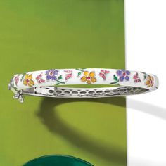 Ross-Simons - Multicolored Enamel Flower Bangle Bracelet in Sterling Silver. 7". Make every day a sunny one with our lovely bangle bracelet, featuring pretty purple, green, orange, pink and white enamel that creates a springtime flower design. Set in polished sterling silver. Hinged with a double-latch safety. Box clasp, multicolored enamel flower bangle bracelet. Multicolor Bangle Jewelry For Spring, White Bangle Jewelry For Spring, Enamel Jewellery, Safety Box, Hermes Bracelet, Enamel Bangle, Pretty Purple, Box Clasp, Enamel Flower