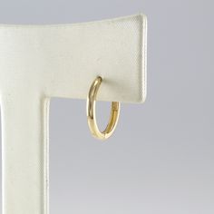 14K 12 mm Solid Gold Huggie Hinged Hoop Earring, Huggie Hoop, Gold Huggie, Small Gold Hoop, Cartilage, Conch, Helix, Tragus, EZ81L EZ81L Please note that this earring is made to order. S P E C S ♦ All of our jewelry is handmade in our studio in Seoul, Korea. ♦ 14K Yellow Gold / 14K Rose Gold ♦ Listing is for 1 Earring ♦ Huggie Dimensions: - outer diameter approximately 12 mm - inner diameter approximately 10 mm - hoop thickness 1.6 mm - post thickness 0.7mm - post length 5.5mm ♦ Metal Finish: Hi Adjustable Small Hoop Classic Cartilage Earrings, Classic Adjustable Hoop Cartilage Earrings, Hoop Cartilage Earrings With Ear Wire, Huggie Earrings Gift, Huggie Hoop Earrings As Gift, Yellow Gold Hoop Cartilage Earrings, Small Gold Hoops, Seoul Korea, Gold Hoops