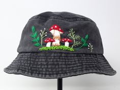 Item: mushroom embroidered bucket hat Material: 100% cotton Size: one size fits most Embroidery: hand made with acrylic thread Free first class shipping, upgradable priority mail service. 30 days return policy, feel confident at your purchase! Embroidered Curved Brim Hat For Outdoor, Outdoor Embroidered Hat With Curved Brim, Whimsical Cotton Cap, Handmade Outdoor Bucket Hat, Embroidered Adjustable Bucket Hat, Handmade Cotton Hats For Outdoor, Handmade Cotton Outdoor Hats, Adjustable Embroidered Bucket Hat, Handmade Short Brim Bucket Hat For Outdoor