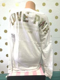 Victoria's Secret PINK Bling Sequin Varsity Crew Pullover Sweatshirt White New with Tag From the Victoria's Secret "PINK" Collection Bling LOVE PINK gold sequin graphic on back Dog logo print on gold foil on front chest 60% Cotton/ 40% Polyester. Measurement XS: armpit to armpit 20.5" . Length 28" Medium : Armpit to Armpit 22.5" . Length 28.5" Large: armpit to armpit 24" . Length 29" SORRY, WE DO NOT SHIP INTERNATIONAL !!! Payment must be made within 3 days after Auction end       Shipping Infor Victoria's Secret Long Sleeve Sweatshirt For Winter, Victoria's Secret Long Sleeve Winter Sweatshirt, Victoria's Secret Cotton Tops For Loungewear, Pink Oversized Long Sleeve T-shirt, Victoria's Secret Cotton Loungewear Tops, Trendy Victoria's Secret Cotton Tops, Victoria's Secret Trendy Cotton Tops, Victoria's Secret Pink Cotton Top, Pink Long Sleeve Top With Letter Print