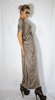 NEW Taupe Gold Maxi Dress / Plus Size Dress / Draping Dress / Loose Dress / Extravagant Maxi Dress / Long Dress / Boho Dress #35378 SEE COLOR CHART HERE : https://www.etsy.com/listing/235259897/viscose-color-chart?ref=shop_home_active_4 - Handmade item - Materials : crystal jersey * Please Note : To keep a stock of a large variety of colors, they may have slight differences in weight and drape - The model wears : size - small , color - Off Black - Fit : Loose fit - Length : 130 cm / 51 inches . Tasseal Maxie Dress Plus Size, Beige Maxi-length Kaftan For Summer, Brown Maxi Length Beach Cover-up Dress, Elegant Beige Maxi-length Kaftan, Dress Draping, Draping Dress, Dress Extravagant, Black Flowy Maxi-length Kaftan, White Kaftan