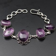 Amethyst Gemstone Bracelet Jewellery Gift for girl Bracelet gift For Her Sterling Silver Pleated Jewellery Beautiful Bracelet Jewellery Materials Sterling Silver Plated Bracelet Size 8 x 1 Stone Name Amethyst Colour Purple Shipping Policy We do ship through DHL, UPS, INDIA POST. I make the gemstones myself for my valued customers so I assure you that the gemstones are Natural and are made from ethically sourced roughs. The rest of the Bracelet is made from 925 Sterling silver Plated 92.5% pure s Amethyst Crystal Bracelet Gift, Sterling Silver Purple Bracelet As Gift, Purple Sterling Silver Bracelet Gift, Purple Sterling Silver Bracelet As Gift, Amethyst Gemstone Bracelets As Gift, Amethyst Gemstone Bracelets For Gifts, Purple Bracelet Jewelry Gift, Amethyst Gemstone Bracelet Gift, Adjustable Purple Bracelets For Formal Occasions