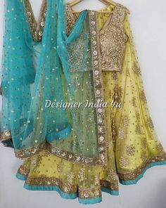 Yellow Net lehenga choli with turquoise dupatta for women. SIZE & STYLE: >You can either choose a standard sizing from size options on the listing. >All Standard sizes lehenga (Skirt) will be having fixed length 41 inches. Please contact if you want to change the lehenga length. >If you select custom size then we will send you measurements form after your order. And discuss all the customisation in detail before processing the order. >You can let us know for Blouse style changes e.g. change of neck designs etc. >Specific to sleeves on the blouse, please write in order notes if you want a sleeveless blouse to have sleeves or vice versa or just drop a message to us. >Tassels & Trims may or may not be exactly same always. >We ensure to show you final product and measurement images before disp Pista Green Lehenga For Festivals, Bollywood Style Pista Green Choli With Unstitched Blouse, Pista Green Lehenga With Unstitched Blouse And Traditional Drape, Designer Pista Green Choli For Festivals, Pista Green Fitted Sharara For Festivals, Pista Green Lehenga With Unstitched Blouse For Festive Occasions, Pista Green Choli With Sheer Dupatta For Navratri, Pista Green Lehenga With Unstitched Blouse, Festive Pista Green Lehenga With Unstitched Blouse