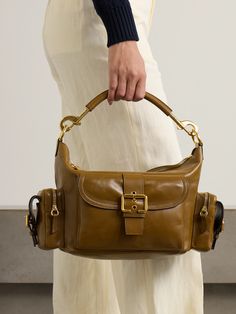 Chloé's 'Camera' bag is a cool re-interpretation of practical vintage styles. Made from leather, it has plenty of outer pockets that create its distinct shape and features polished gold-tone hardware, including buckled straps. Carry it by the detachable top handle or adjustable cross-body strap, and stow your wallet, sunglasses case and a cosmetics pouch inside. Vintage Chloe Bag, Vintage Chloe, Cosmetics Pouch, Raffia Bag, Boot Pumps, Chloe Bag, Cosmetic Pouch, Crossbody Strap, Fashion Bracelets