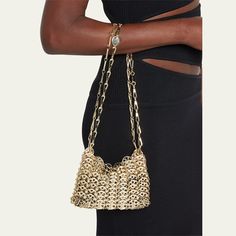 Paco Rabanne "Iconic" link-chain mini shoulder bag. Chain top handle. Shoulder strap loops through rings. Dipped open top. Unlined interior. Imported. Luxury Evening Bag With Chain Strap In Bucket Shape, Designer Gold Evening Bag With Chain Strap, Luxury Bucket Evening Bag With Chain Strap, Evening Shoulder Bag With Chain And Top Handle, Evening Top Handle Shoulder Bag With Chain, Evening Shoulder Bag With Top Handle And Chain, Gold Top Handle Shoulder Bag With Chain Strap, Gold Shoulder Bag With Chain Strap And Top Handle, Modern Party Bag With Chain Detail