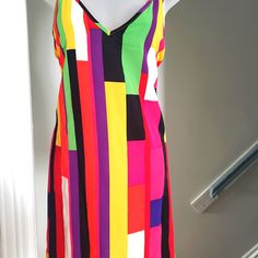 Sizzling Colored Mini Dress Trendy Multicolor Midi Dress For Night Out, Bold Dresses For Spring Vacation, Multicolor Spring Midi Dress For Night Out, Spring Night Out Multicolor Midi Dress, Multicolor Midi Dress For Night Out In Spring, Multicolor Midi Dress For Spring Night Out, Bold Sleeveless Summer Dresses, Multicolor Midi Dress For Summer Night Out, Bold Summer Vacation Dresses