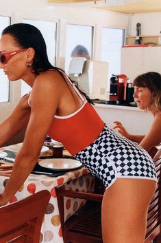 For our Northern Hemi friends, find this style on Free People Our original Betty Bottom has had a revamp: featuring a super high, double-lined waistband with internal elastic for anti-pulldown, this boy short cut is a knockout in the surf and equally as comfortable hanging at the beach. Now in B+W Checkers with white trim for that 70s jogger vibe. This style is made by our team in Australia Swimming Activities, Surf Wear, Scalloped Hem, Italian Fabric, Short Cuts, White Trim, Boy Shorts, Equatorial Guinea, Ethiopia