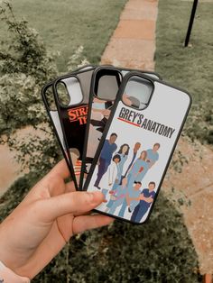 someone holding up their phone case to show them the cover for grey's anatomy