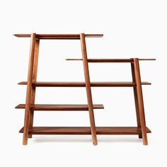 a wooden shelf with three shelves on each side