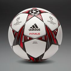 the adidas finale soccer ball is shown in white and red stripes, on a gray background