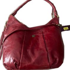 Designer Red Shoulder Bag, Formal Red Hobo Bag, Luxury Red Satchel Hobo Bag, Luxury Red Tote Bag, Elegant Red Hobo Shoulder Bag, Elegant Red Hobo Bag With Gold-tone Hardware, Red Hobo Bag With Gold-tone Hardware, Chic Red Hobo Bag With Detachable Handle, Red Hobo Bag With Gold-tone Hardware For Everyday