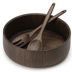 two wooden bowls with spoons in them