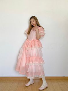 Designer Brand: August Unicorn Peiliee Co.,Ltd is the original retailer of designer brand August Unicorn Size guide S: bust: 88cm, shoulder: 30cm, dress length: 105-114cm, waist: 78cm M: bust: 92cm, shoulder: 32cm, dress length: 110-119cm, waist: 82cm For customized sizing, please email us your size measurements for bust, waist, hips, height and dress length you wish to info@peilieeshop.com 💞 Pink Ruffled Tea Length Dress, Pink Ruffled Tea-length Dresses, Pink Tea Length Ruffled Dress, Pink Tea-length Ruffled Dresses, Feminine Midi Lace Dress With Lace Collar, Feminine Tiered Midi Dress With Lace Trim, Ruffled Lace Midi Dress For Garden Party, Lace Knee-length Midi Dress With Ruffles, Lace Midi Dress With Ruffles, Knee-length