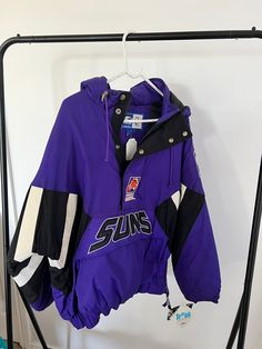 RARE  Vinatge 1991 Phoenix Suns NBA starter jacket with original tags on  Super rare collectors piece perfect to add to your vintage collection  Mens Medium but fits more like a traditional large Retro Hooded Varsity Jacket For Streetwear, Vintage Winter Track Jacket For Sports Events, Vintage Purple Windbreaker For Streetwear, 90s Style Long Sleeve Outerwear For Sports Events, Vintage Long Sleeve Track Jacket For Sports, Retro Hooded Track Jacket For Streetwear, Retro Hooded College Windbreaker, Vintage Hooded Windbreaker For Streetwear, Throwback Winter Windbreaker For College