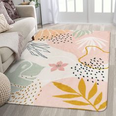 an area rug with flowers and leaves on it