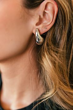 Add some glam to your earring collection with our Silver Plated Drop Earrings! Lightweight on the ear and a fun twist on the classic gold hoop, a perfect statement piece. They are great for everyday wear, wedding, festival, or enjoying a GNO! Non-tarnish, water resistant. Made in Italy. Will ship 9/28. Lightweight 1/2" wide x 1" long Chic Small Hoop Earrings For Anniversary, Elegant Huggie Earrings For Party, Nickel-free Gold-plated Hoop Earrings For Party, Gold Drop Cartilage Earrings For Party, Rose Gold Small Hoop Earrings For Party, Chic Rose Gold Hoop Earrings For Pierced Ears, Chic Huggie Earrings For Pierced Ears, Party Huggie Hoop Earrings, Chic Tarnish Resistant Hoop Earrings For Anniversary