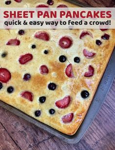 a sheet pan filled with fresh fruit and topped with text that reads, sheet pan pancakes quick & easy way to feed a crowd