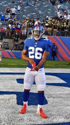 a football player is standing on the field