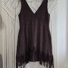 This Is A Closet Staple Here. Style This Dress On Any Season Of The Year. This Gorgeous Brown Suede Dress With Fringe Will Surely Elevate Your Closet. Size Small Fitted V-neck Mini Dress For Festival, Sleeveless Brown Dress With Fringe, Sleeveless Brown Fringe Dress, Brown Sleeveless Fringe Dress, Fitted Brown Dress For Festival, Casual V-neck Dress With Fringe, Fitted Brown Dresses For Festivals, Casual V-neck Fringe Dresses, Brown Suede Dress