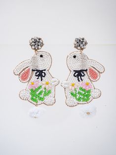 These Emma Easter Rabbit Garland Bead Mix Drop Earrings combine playful charm with elegant design. Featuring delicate rabbit garlands and colorful bead mix drops, these earrings are the perfect addition to any Easter outfit. Made with expert craftsmanship and attention to detail, these earrings are sure to delight and impress. SizeHEIGHT: 2.4"WIDTH: 2.25" QualityMade with premium materials for endurance. ImportedE14249WT Pearl Shop, Holiday Essentials, Easter Outfit, Easter Rabbit, Cotton Ball, Pearl Set, Halloween Birthday, Mardi Gras, Fascinator