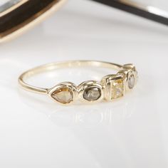 From our Stardust collection, wear one or collect them all for the perfect stack! This ring is great as a wedding band. Details: -18k yellow gold -five natural color diamonds in mix shapes and colors -handmade in NYC Multi Shape Wedding Band, Gold Stackable Multi-stone Diamond Rings, Gold Diamond Stackable Rings With Multi-stone, Multi Diamond Ring, Colored Diamond Rings, Real Gold Jewelry, Shapes And Colors, Fine Diamond Jewelry, Engagement Band