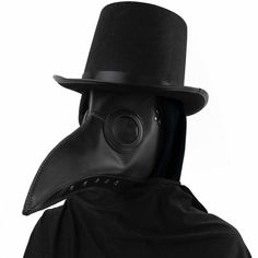 a man wearing a black plague mask with a hat on his head