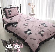 a bed with pink sheets and black ruffles