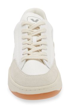 Complete your casual ensembles with this low-cut leather sneaker featuring breathable mesh for comfortable ventilation. Lace-up style Removable insole Leather and textile upper/textile lining/rubber and synthetic sole Made in Brazil White Mesh Sneakers With Textured Sole, Mesh Lace-up Sneakers With Vulcanized Sole, White Textile Sneakers With Perforated Toe Box, Sporty Canvas Sneakers With Perforated Toe Box, Mesh Sneakers With Perforated Toe Box And White Sole, Sports Canvas Sneakers With Perforated Toe Box, Canvas Sneakers For Light Sports, Made In Brazil, Emphasis