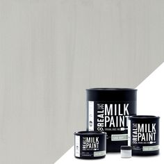 three different types of paint on a white and gray background