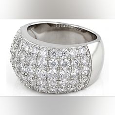 925 Sterling Silver Pave Cubic Zirconia Band Ring Size: 7 Brand New Without Tags Made With Solid .925 Sterling Silver Domed, Wide Band Pave Design Of 5.64 Ctw Cubic Zirconia Gemstones (35 In Total) Stamped '925' And Signed With Jeweler's Hallmark. Weight: 9g (Approx.) Excellent Condition! No Flaws. About Me: I'm Disabled With A Severe Chronic Illness Condition That Has Left Me Unable To Work. I Have No Savings, No Income, And No Financial Support Of Any Kind. Please Know That By Supporting My Po Classic Silver Rings With Sparkling Stones, Silver Cubic Zirconia Diamond Ring With Sparkling Stones, Diamond White Crystal Ring With Sparkling Cubic Zirconia, Silver Diamond Ring With Sparkling Stones, Silver Rings With Sparkling Stones Round Cut, White Gold Cubic Zirconia Crystal Ring With Sparkling Stones, Classic Sterling Silver Rings With Sparkling Stones, White Gold Cubic Zirconia Ring With Sparkling Stones, Diamond White Diamond Ring With Sparkling Stones