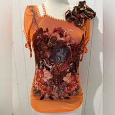 Save The Queen Top Shirt Blouse Nwt Size M Orange Multicolored Floral Decorative Top Orange Short Sleeve Blouse For Fall, Casual Orange Blouse With Graphic Print, Orange Graphic Print Top For Summer, Summer Orange Tops With Graphic Print, Fitted Orange Tops With Graphic Print, Fitted Orange T-shirt For Spring, Orange Floral Print Tops For Summer, Fitted Orange Floral Print Tops, Fitted Burnt Orange Top For Summer