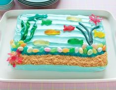 there is a cake that looks like it has been made to look like the ocean